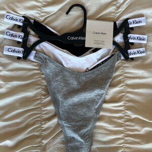 Calvin Klein Modern Logo Dipped String Thong (Pack of 3 + 1 free)